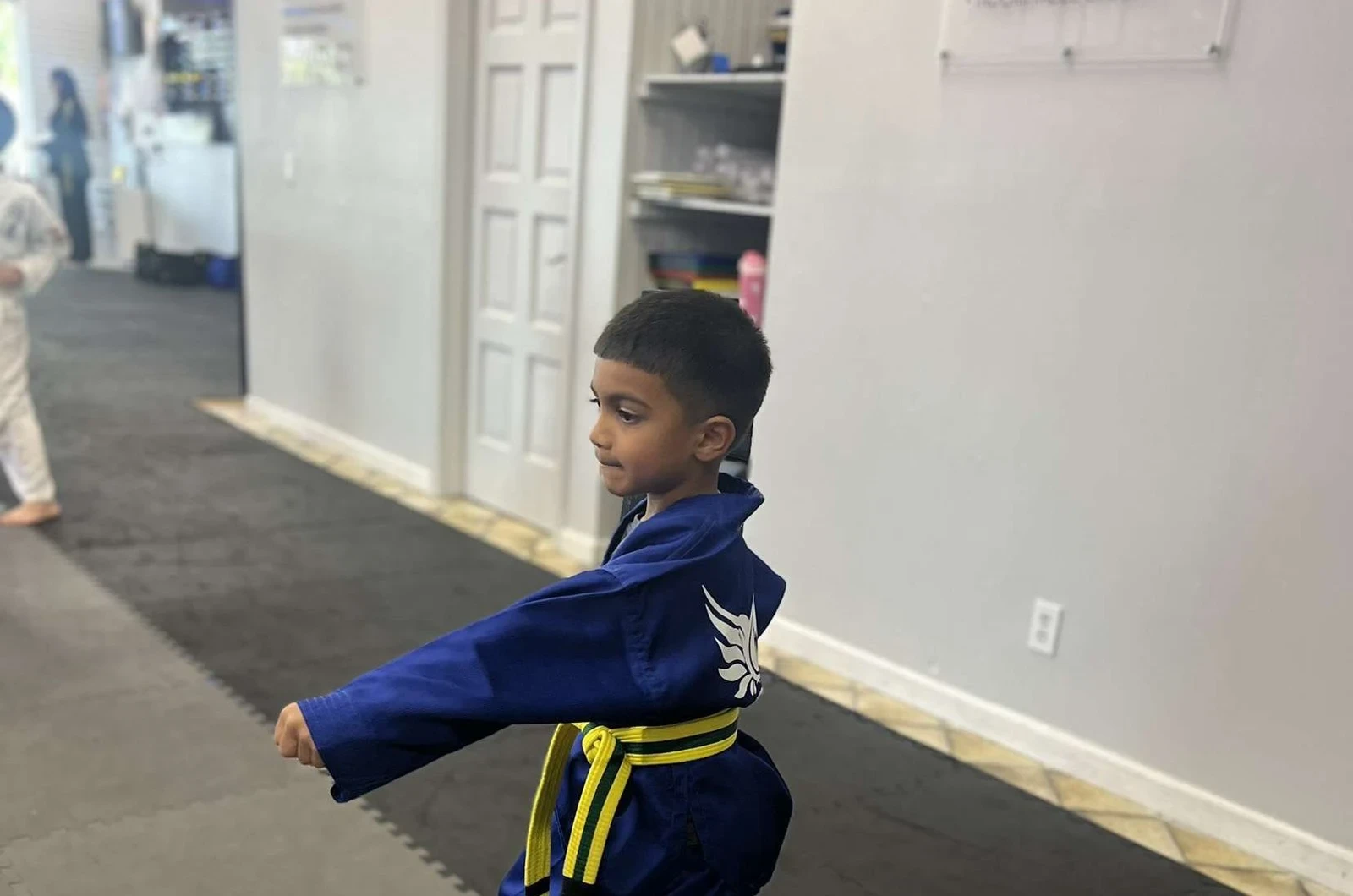 Child building coordination in martial arts